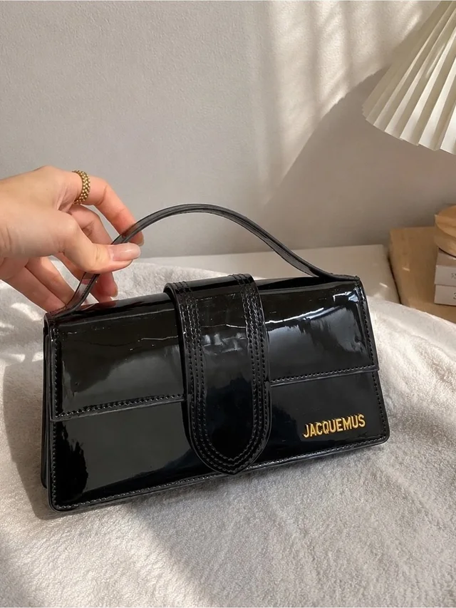 Jacquemus Patent Mini Top-Handle Bag With Gold Logo in black Patent leather from Poshmark