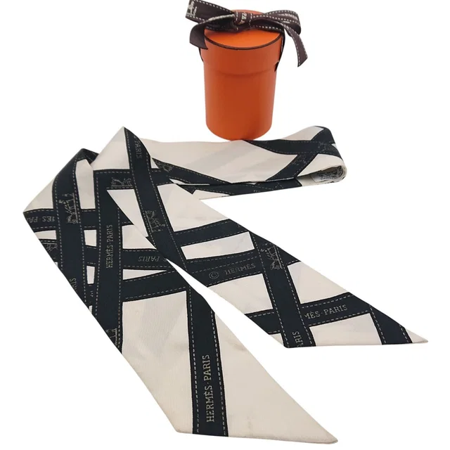 Hermès Twilly Bolduc Ribbon Pattern White Black Scarf in Black Silk from The Reluxe