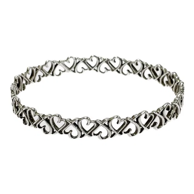 Tiffany & Co. Silver Loving Heart Bangle Bracelet in Silver from The Reluxe
