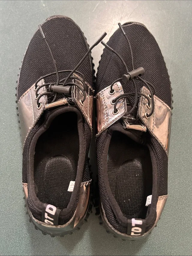Omega Women's Black Metallic Accent Athletic Shoes in black|gray|silver from Poshmark