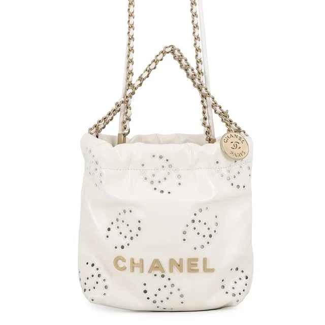 Chanel Handbag 22 Mini Perforated CC Logo Shiny Calf Leather 2-Way White in White Calfskin from The Reluxe