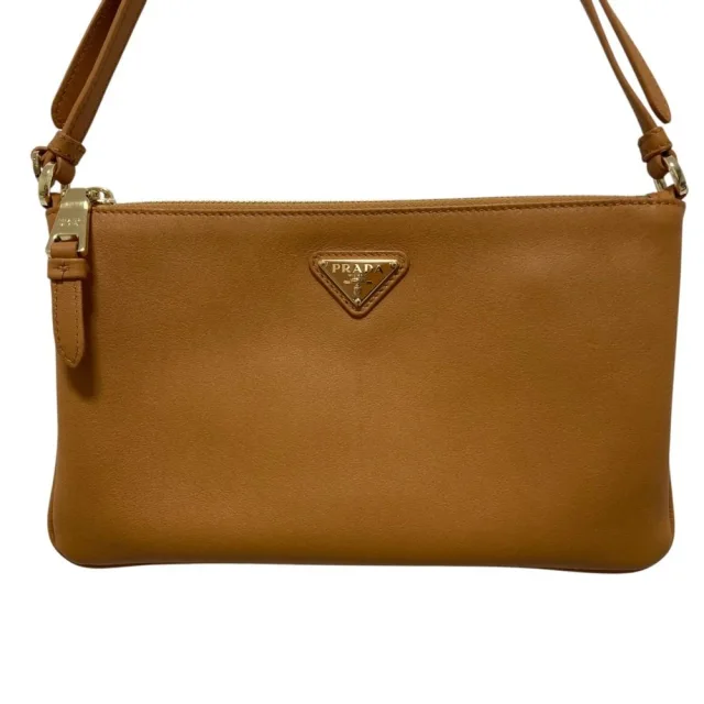 Prada Triangle Plate Soft Grain Leather Shoulder Bag in Brown Leather from LuxUness, photo 3 of 16