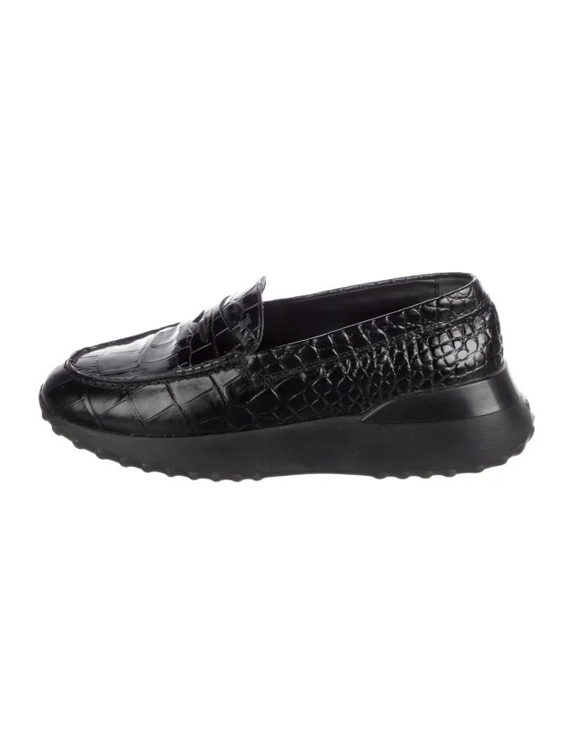 Tod's Embossed Leather Animal Print Loafers in black Leather from The RealReal