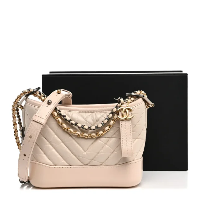 Chanel Aged Calfskin Chevron Quilted Small Gabrielle Hobo Ivory in White Calfskin from FASHIONPHILE, photo 12 of 12