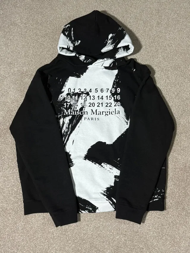 Maison Margiela Ink Print Hoodie in black from Grailed