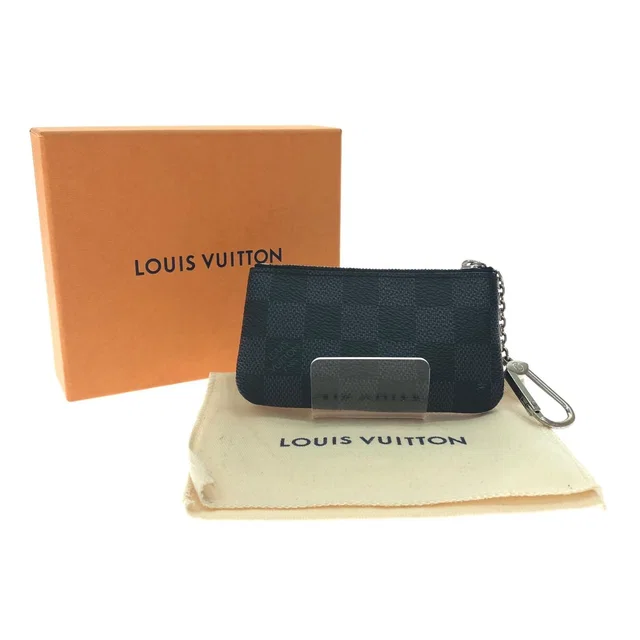 Louis Vuitton Coin Purse Damier Graphite Gray in Grey Coated canvas from The Reluxe