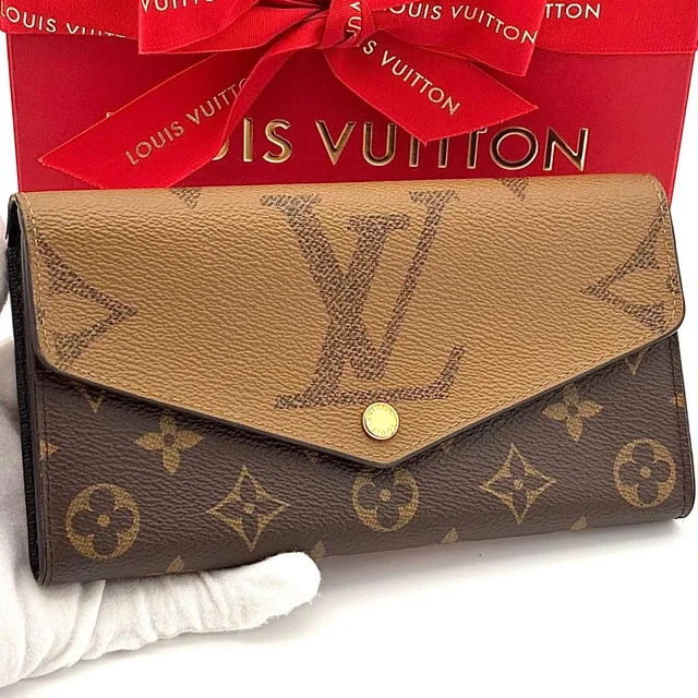 Louis Vuitton Wallet Monogram Giant Portefeuille Sarah Brown in Brown from The Reluxe
