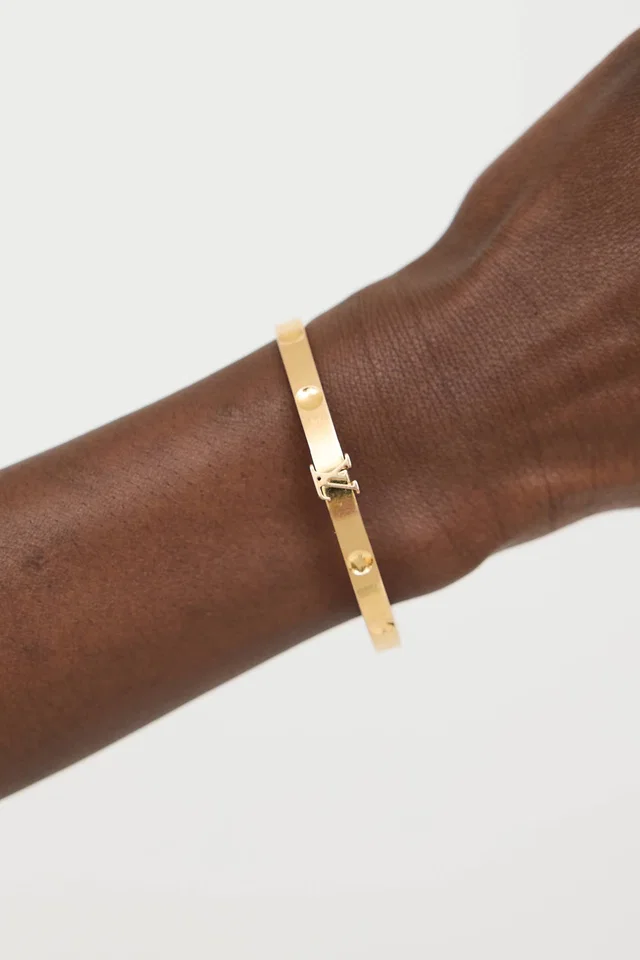 Louis Vuitton 18K Yellow Gold Empreinte Medium Bangle in Yellow from VSP Consignment