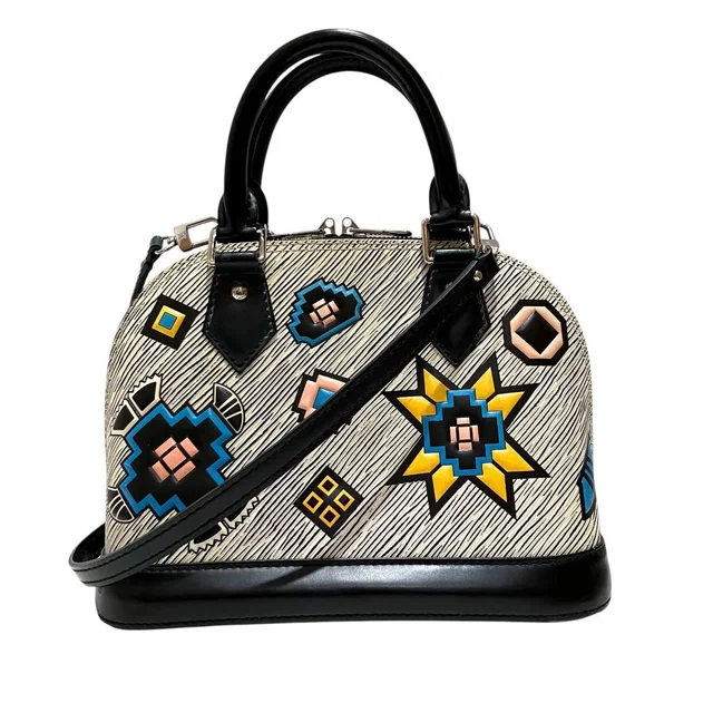 Louis Vuitton Alma BB Epi Handbag Leather in Leather from The Reluxe