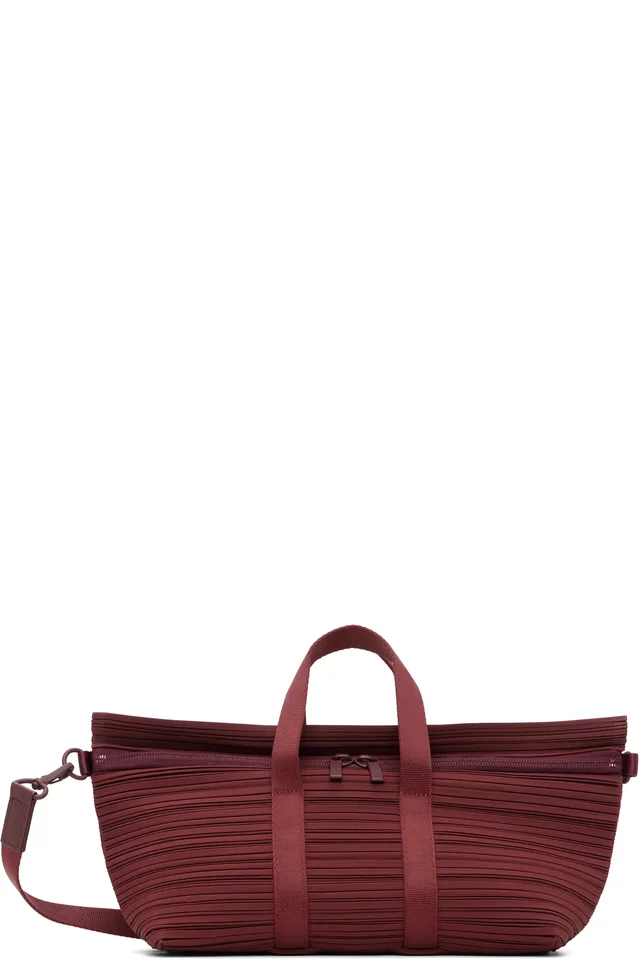 PLEATS PLEASE ISSEY MIYAKE Burgundy Pleats Boston Bag from SSENSE, photo 1 of 1