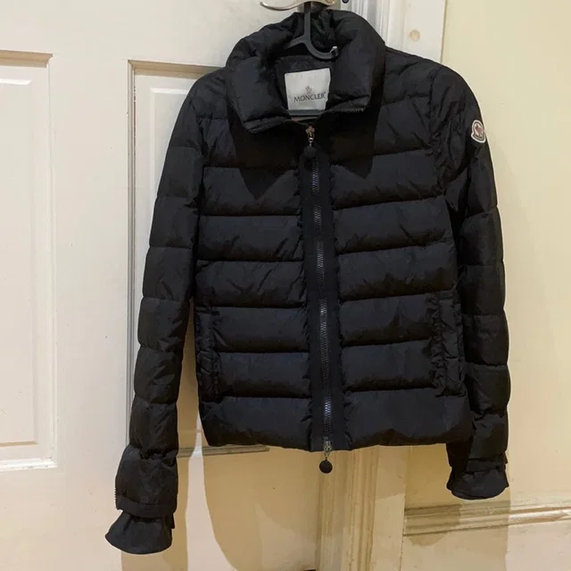 Moncler Quilted Down Jacket in black from Poshmark
