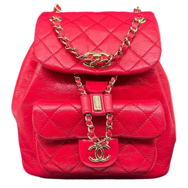 Chanel Duma Pockets Small Aged Calfskin Quilted Leather Drawstring Backpack Pink in Pink Calfskin from Dallas Designer Handbags