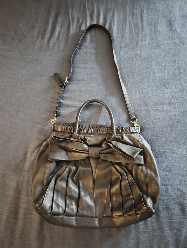 REDValentino Elegant Black Bow-Accent Women's Tote Bag in black Leather from Poshmark