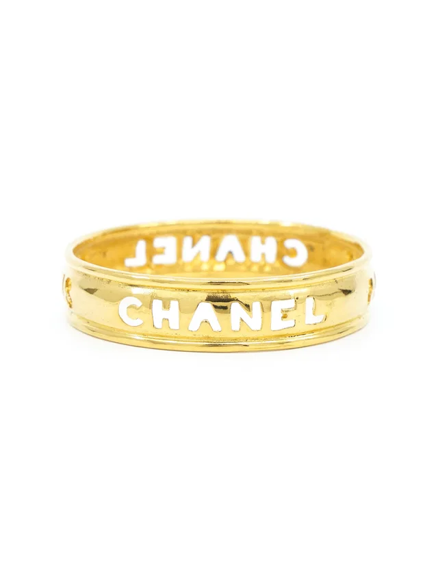1980s Chanel Cutout Logo Arm Bangle from Arcade Vintage