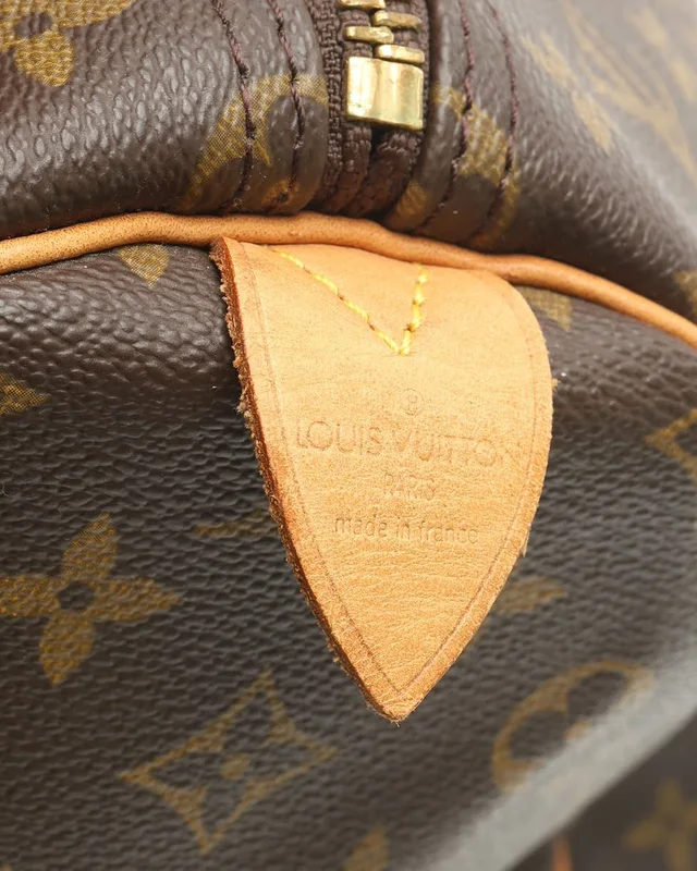 Louis Vuitton Monogram Keepall 55 Weekend Bag in Coated canvas from A Retro Tale, photo 10 of 13