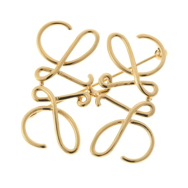 Loewe Gold Brooch in gold from Poshmark