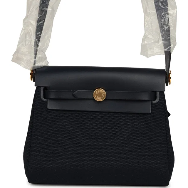 Hermès Herbag Zip 20 Mini Bleu Indigo Toile Militaire Canvas, Vache Hunter Gold Hardware in Blue Canvas from Madison Avenue Couture
