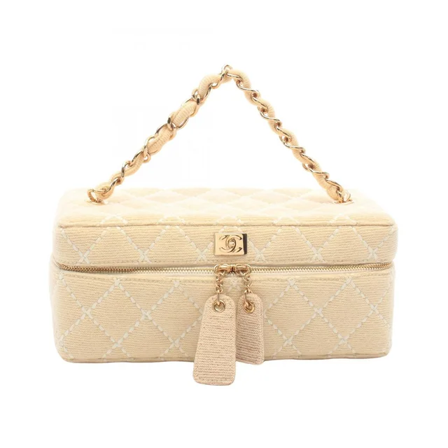 Chanel Handbag Wild Stitch Cream Canvas Quilted Chain Handle Vanity Bag in White Canvas from The Reluxe