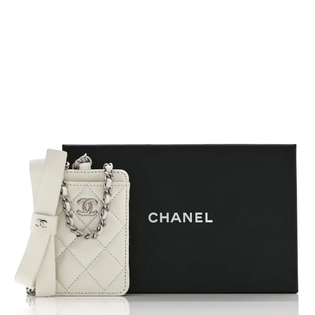 Chanel Iridescent Lambskin Quilted Coco Bow Card Holder On Chain White in White Lambskin from FASHIONPHILE, photo 9 of 9