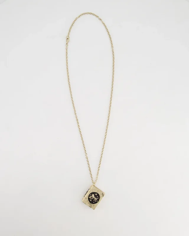 Chanel Champagne Gold, Star Lion and CC Logo Book Pendant Necklace in Gold from Sellier, photo 2 of 7