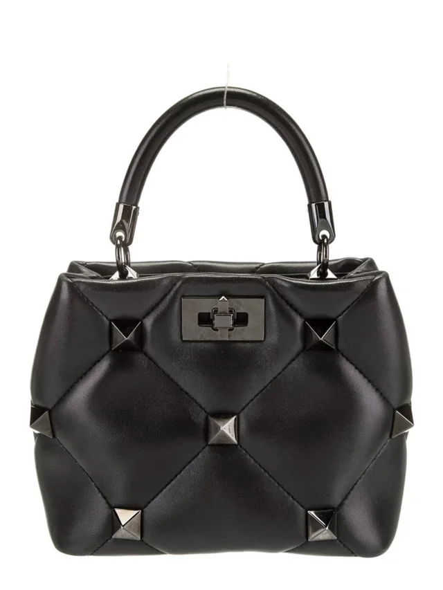 Valentino Garavani Quilted Rock Stud Top-Handle Bag in black Leather from Poshmark