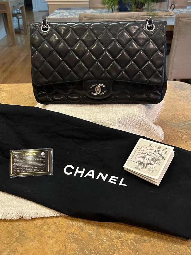 Chanel Iconic Classic Double Flap Quilted Lambskin Bag in silver|black|gray Lambskin from Poshmark, photo 1 of 1