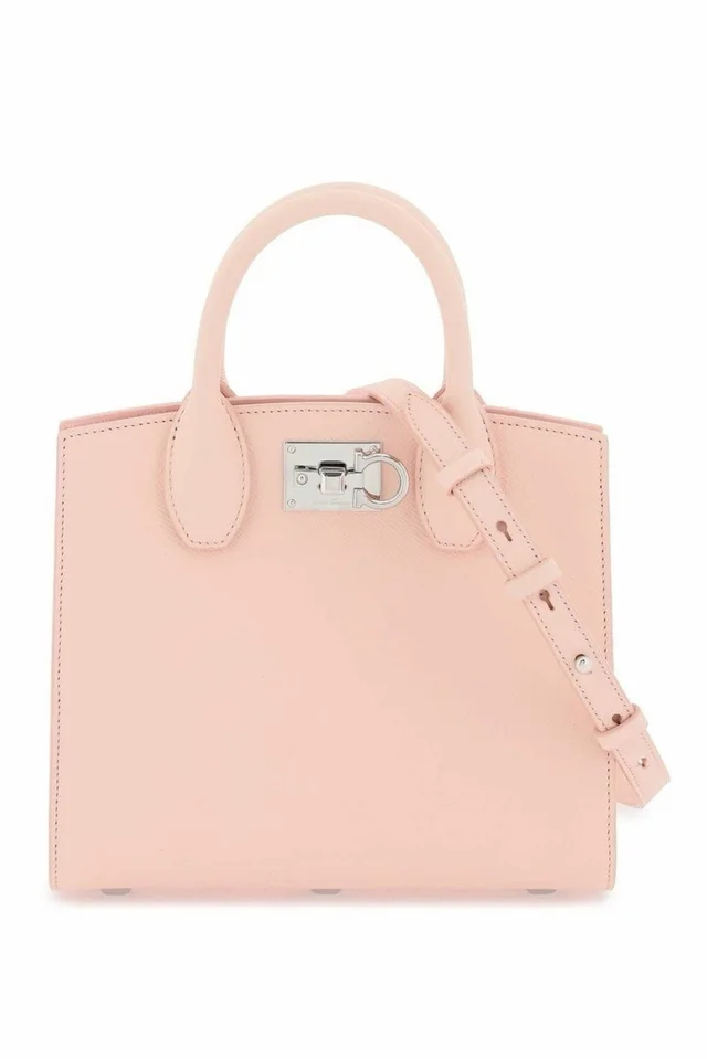 Ferragamo Studio Bag Pink Leather Gancini Lock Top Handle W Strap in pink Leather from Poshmark, photo 1 of 1