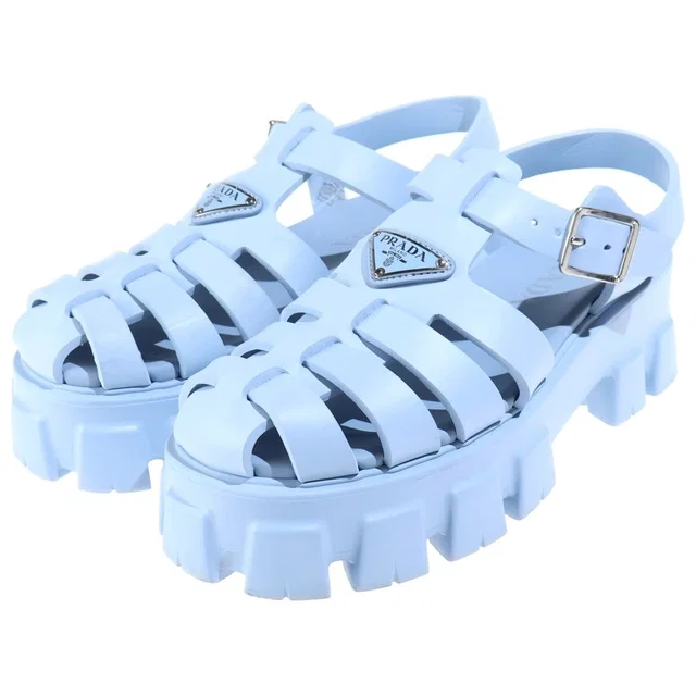 Prada Monolith Rubber Flat Sandals Triangle Logo Blue in Blue from The Reluxe