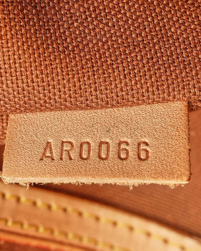 Louis Vuitton Monogram Keepall Bandoulière 60 Weekend Bag in Coated canvas from A Retro Tale, photo 10 of 12