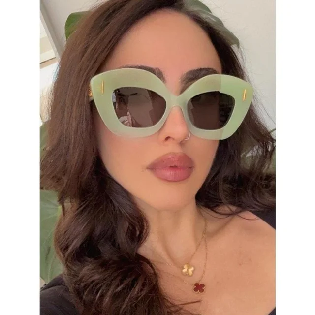 Loewe Women's Sunglasses - Green/Red in red|green from Depop, photo 1 of 1