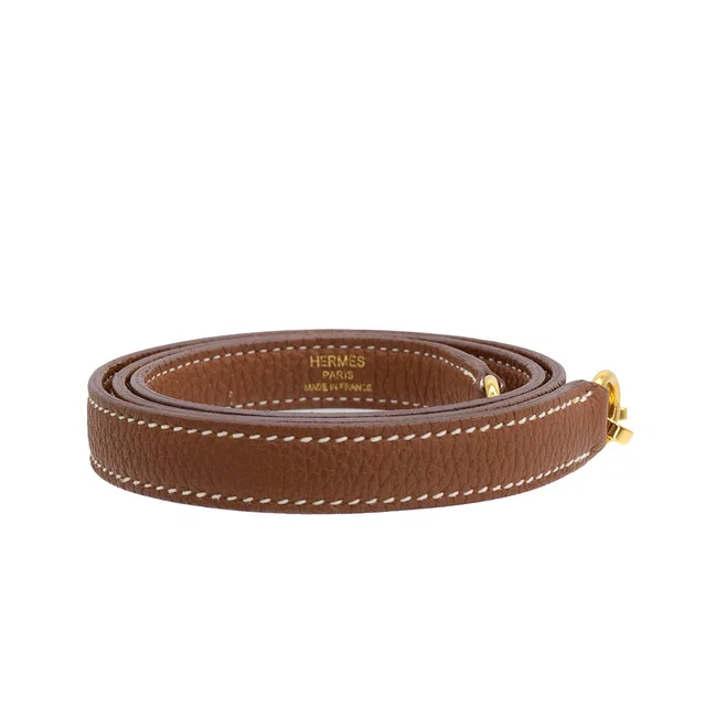 Hermès Kelly Bolide Gold Taurillon Clemence Shoulder Strap Gold Hardware in Gold Clemence leather from Luxury Promise