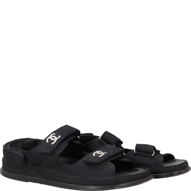Chanel Black Quilted Fabric CC Dad Sandals in Black Woven leather from HEWI