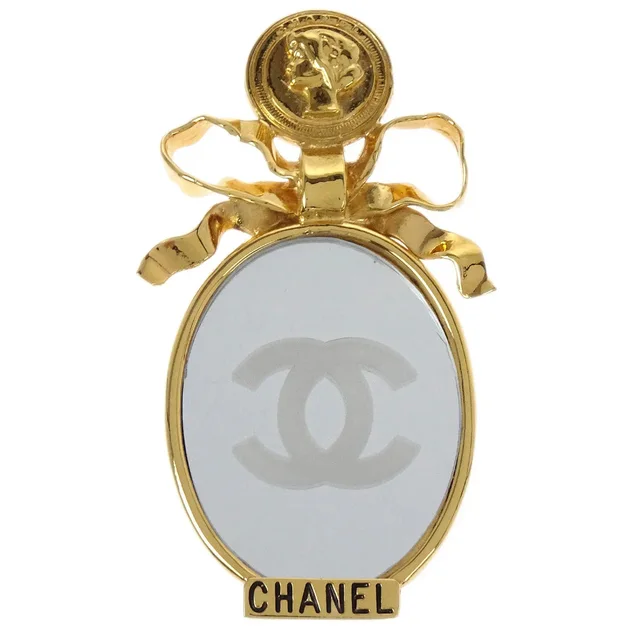 Chanel Bow Mirror Brooch Pin Gold in Gold from AMORE Vintage Tokyo