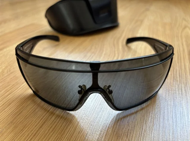 Prada Vintage Sunglasses in black from Grailed