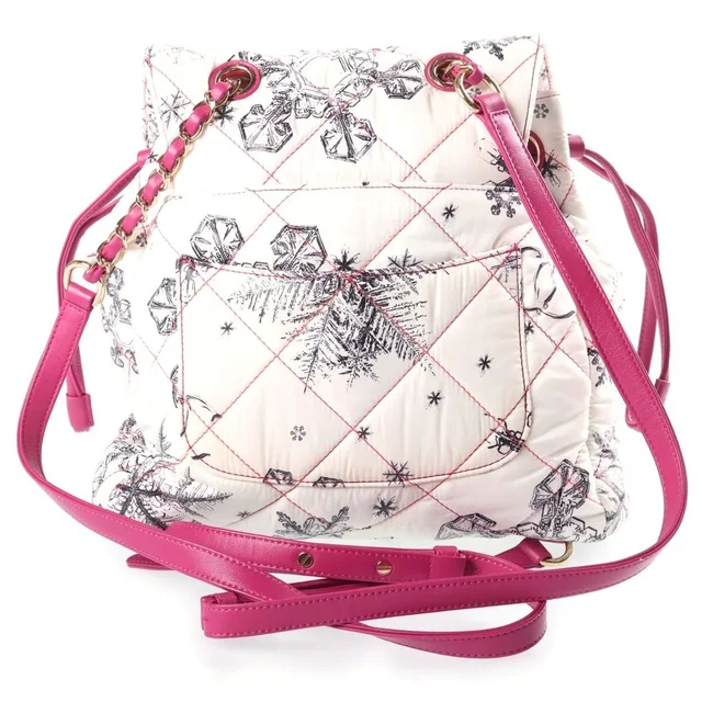 Chanel Coco Neige Backpack Snowflake Nylon Leather Gold White in White Nylon from The Reluxe, photo 2 of 2
