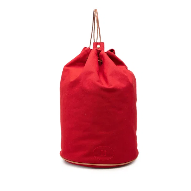 Red Hermès Toile Polochon Mimile Backpack in Red Canvas from Designer Revival