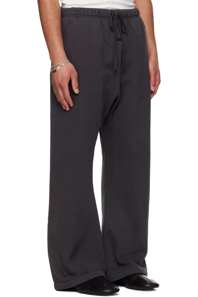 Fear of God ESSENTIALS Black Signature Classic Flare Sweatpants, photo 2 of 4 from SSENSE
