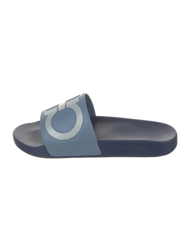 Ferragamo Gancini Logo Rubber Slides in blue from The RealReal