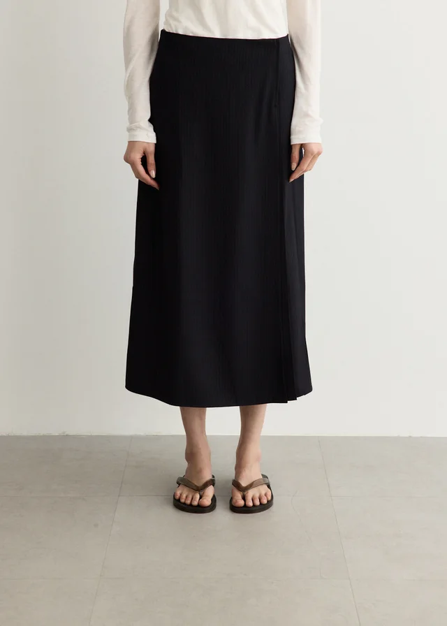 Incu Collection Savile Pleated Pinstripe Skirt in Black from Incu, photo 1 of 1