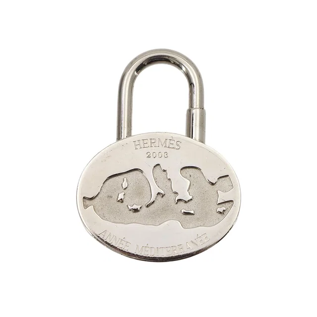 Hermès Cadena Charm Annee Mediterranee Mediterranean Gold Keychain in Gold Leather from The Reluxe