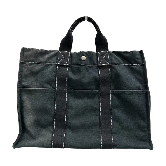Hermès Deauville MM Black Silver Canvas Handbag in Black Canvas from The Reluxe