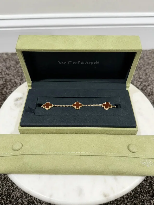 Van Cleef & Arpels Van Cleef Vintage Alhambra 5-Motif Gold Carnelian Bracelet in multicolor from Grailed