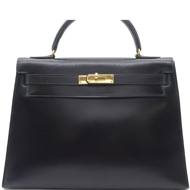 Hermès Kelly 32 Handbag in Box leather from The Reluxe