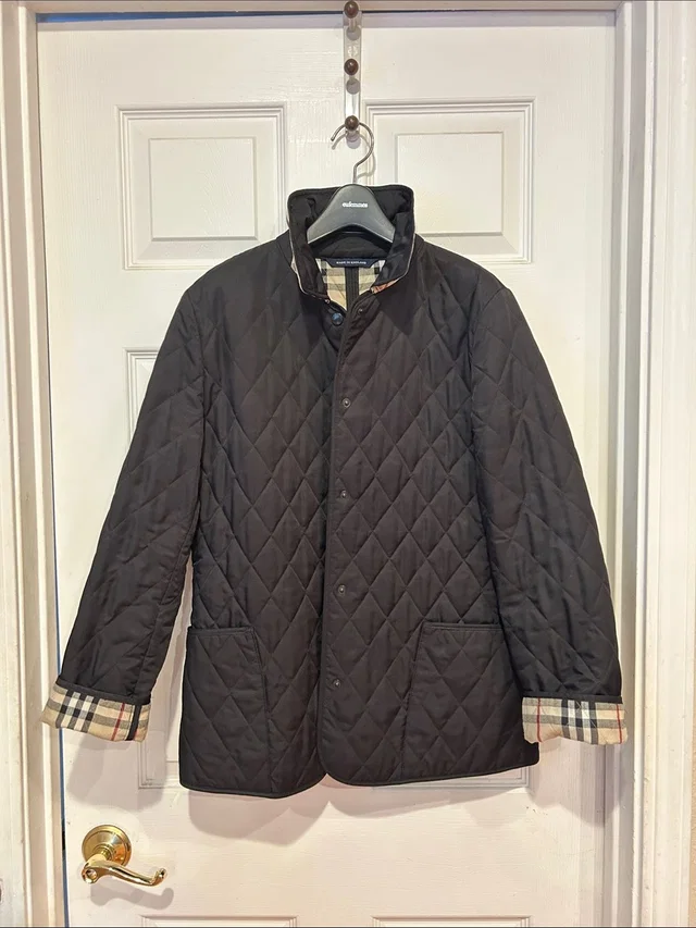 Burberry Black Quilted Shirt Jacket With Check Cuff Trim in black|brown|neutral from Poshmark, photo 1 of 1