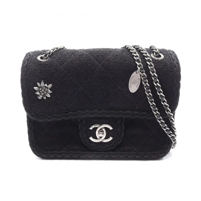 Chanel Shoulder Bag Quilted Edelweiss Black Wool Chain in Black Wool from The Reluxe