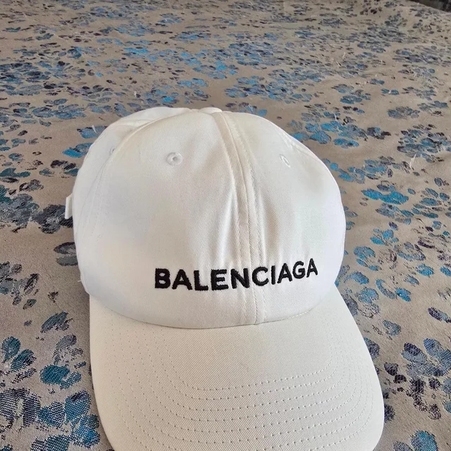 Balenciaga Men's Hat - White in white from Depop, photo 1 of 1
