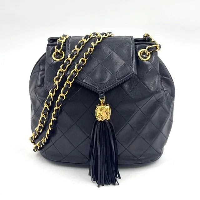 Chanel Quilted Tassel Lambskin Black Chain Shoulder Bag Gold in Black Lambskin from The Reluxe