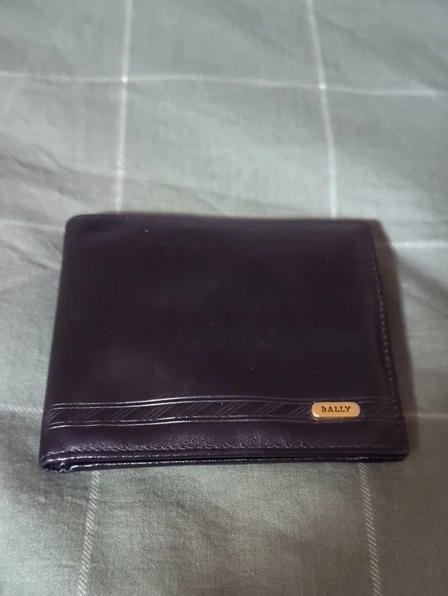 Bally Dark Brown Leather Bi-Fold Wallet in black Leather from Poshmark
