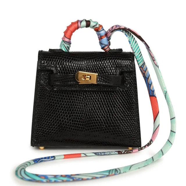 Hermès Mini Kelly Twilly Bag Charm Black Shiny Niloticus Lizard Gold Hardware in Black Lizard from Madison Avenue Couture