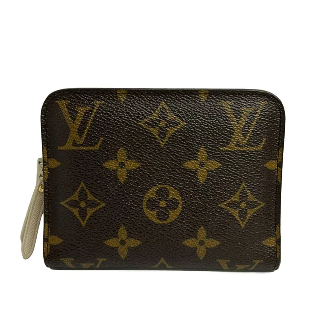 Louis Vuitton Coin Purse Monogram Portefeuille Monnaie Insolite Ivoire in Coated canvas from The Reluxe